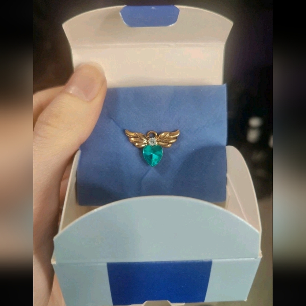 Vintage Avon Tiny Angel Birthstone Pin December/Simulated Blue Topaz Brooch 2002